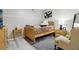 Inviting bedroom with chair, desk, and a modern, comfortable bed at 106 Thornwood Dr, Woodstock, GA 30188