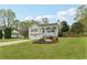 Charming single-Gathering home with a well-manicured front yard and inviting curb appeal at 106 Thornwood Dr, Woodstock, GA 30188