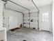 Spacious two-car garage with ample storage space and a clean, modern design at 106 Thornwood Dr, Woodstock, GA 30188