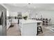 Modern kitchen with white cabinets, stainless steel appliances, and a large center island at 106 Thornwood Dr, Woodstock, GA 30188