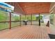 Relaxing outdoor patio featuring a grill with scenic views at 106 Thornwood Dr, Woodstock, GA 30188