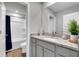 Modern bathroom featuring a shower/tub combo and granite counters on the vanity at 319 Overlook Rd, Covington, GA 30014