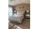 Bedroom with a plush bed, mirrored nightstands, and natural light at 3627 Mcclaren Way, Lawrenceville, GA 30044