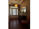Welcoming entryway features a decorative table, mirror, and a glass-paneled front door and transom window at 3627 Mcclaren Way, Lawrenceville, GA 30044