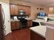 Modern kitchen featuring stainless steel appliances, sleek countertops, and ample storage at 3627 Mcclaren Way, Lawrenceville, GA 30044