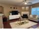Inviting living room with decorative fireplace, plush seating, and modern decor at 3627 Mcclaren Way, Lawrenceville, GA 30044