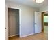 Bright bedroom with ample closet space, neutral paint and wood floors at 6213 Marbut Farms Chase, Lithonia, GA 30058