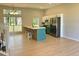 Bright kitchen featuring a large island, stainless steel appliances, and stylish two-tone cabinets at 6213 Marbut Farms Chase, Lithonia, GA 30058
