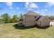 New construction home featuring a large backyard and brick at 920 Melody Ridge Ln, Buford, GA 30518