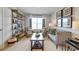 Comfortable upstairs loft area with neutral walls and carpeted floors, a place to sit and relax at 166 Aster Avenue, Locust Grove, GA 30248