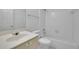 Clean bathroom featuring a white vanity, toilet, and a shower-tub combination with tile surround at 2500 Waterstone Way, Marietta, GA 30062