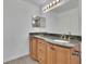 Bathroom featuring a double vanity with granite countertop at 2500 Waterstone Way, Marietta, GA 30062