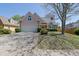 Charming home features a well-maintained front yard and two-car garage at 2500 Waterstone Way, Marietta, GA 30062