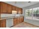 Spacious kitchen featuring granite countertops and stainless steel dishwasher at 2500 Waterstone Way, Marietta, GA 30062