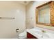 Bathroom featuring a wood-trimmed vanity and gold hardware at 305 Heards Ferry Rd, Atlanta, GA 30328