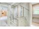Bathroom featuring patterned tile shower and gold trim at 305 Heards Ferry Rd, Atlanta, GA 30328