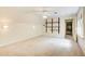 Bedroom featuring carpeted floors and built-in shelving at 305 Heards Ferry Rd, Atlanta, GA 30328