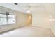 Bedroom featuring neutral walls, carpeted floors, and large windows at 305 Heards Ferry Rd, Atlanta, GA 30328
