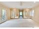 Spacious bedroom featuring wall-to-wall closets with mirrored doors at 305 Heards Ferry Rd, Atlanta, GA 30328