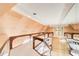 Second floor hallway features wood railings and architectural details at 305 Heards Ferry Rd, Atlanta, GA 30328