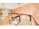 Second floor hallway features wood railings and architectural details at 305 Heards Ferry Rd, Atlanta, GA 30328