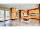 Modern kitchen with updated appliances, an island with granite countertop, and access to the backyard at 305 Heards Ferry Rd, Atlanta, GA 30328