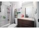 Bathroom featuring shower with curtain, toilet, and vanity with a stone countertop at 3665 Essex Ave # 28, Atlanta, GA 30339
