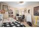 Comfortable bedroom with a workspace featuring a desk and shelving unit at 3665 Essex Ave # 28, Atlanta, GA 30339