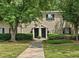 Charming two-story townhome with lush landscaping, brick facade and inviting walkway at 3665 Essex Ave # 28, Atlanta, GA 30339