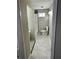 Updated bathroom features a marble-tiled shower, gray tile floors, and a modern toilet at 4844 Fairforest Dr, Stone Mountain, GA 30088