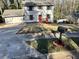 Well-maintained home with a two-car garage and a mailbox, offering a welcoming curb appeal at 4844 Fairforest Dr, Stone Mountain, GA 30088