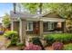 Charming brick home with a welcoming front porch and beautiful landscaping at 758 Argonne Ne Ave, Atlanta, GA 30308