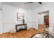 Stylish living room with hardwood floors, wainscoting, and tasteful decor at 758 Argonne Ne Ave, Atlanta, GA 30308