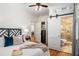 Comfortable main bedroom featuring hardwood floors, a closet and an en suite bathroom at 758 Argonne Ne Ave, Atlanta, GA 30308