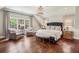 Spacious bedroom with hardwood floors, ample seating, and large windows with natural light at 4431 Skyland Ne Dr, Atlanta, GA 30342