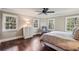 Bright bedroom with hardwood floors, natural light, and a sitting area at 4431 Skyland Ne Dr, Atlanta, GA 30342