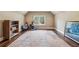 Spacious bonus room with hardwood floors and a large window perfect for a home gym or flex space at 4431 Skyland Ne Dr, Atlanta, GA 30342