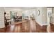 Dining room featuring hardwood floors, wainscoting, large windows, and stylish chandelier at 4431 Skyland Ne Dr, Atlanta, GA 30342