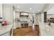 Gourmet kitchen with stainless steel appliances, marble countertops, and custom cabinetry for ample storage at 4431 Skyland Ne Dr, Atlanta, GA 30342