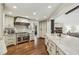 Spacious gourmet kitchen with stainless steel appliances, custom cabinetry, and a large center island at 4431 Skyland Ne Dr, Atlanta, GA 30342