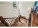 Bright staircase landing with hardwood floors, a bench seat, wainscoting and natural light from a window at 4431 Skyland Ne Dr, Atlanta, GA 30342