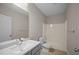 Bathroom features a shower-tub combo, light countertops, and modern fixtures at 4866 Pinnacle Dr, Stone Mountain, GA 30088