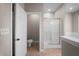Bathroom features a shower, tile floors, toilet and neutral colored walls at 4866 Pinnacle Dr, Stone Mountain, GA 30088