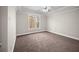 Large carpeted bedroom features a window for natural light and fresh air at 4866 Pinnacle Dr, Stone Mountain, GA 30088