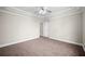 A roomy bedroom features neutral colors and carpet floors at 4866 Pinnacle Dr, Stone Mountain, GA 30088