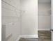 Walk-in closet with ample shelving for organization and storage at 4866 Pinnacle Dr, Stone Mountain, GA 30088