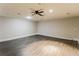 Finished basement with stylish floors, providing a versatile and spacious area at 8404 Park Ridge Ln, Riverdale, GA 30274