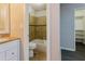 This bathroom has tile flooring and shower surround, and features a granite countertop on the vanity at 8404 Park Ridge Ln, Riverdale, GA 30274