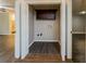 This laundry room has washer and dryer hookups and a storage cabinet at 8404 Park Ridge Ln, Riverdale, GA 30274