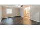Comfortable bedroom with hardwood floors, great lighting, and a neutral color scheme at 8404 Park Ridge Ln, Riverdale, GA 30274